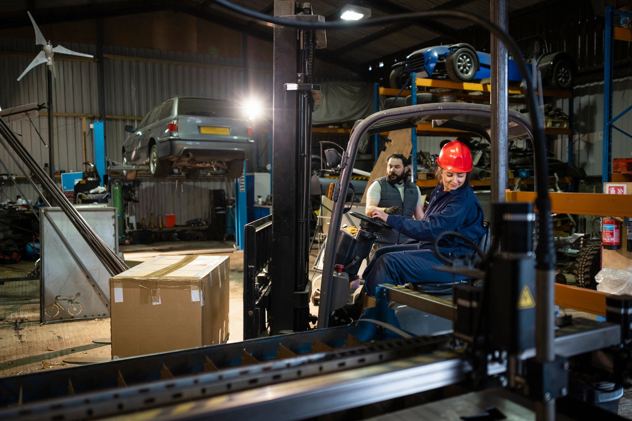 Auto service team working inside a repair facility